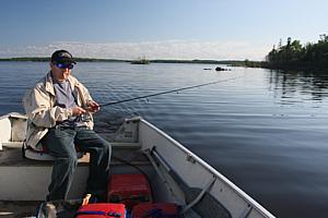 Al Sebastian fishing (deep in thought) at Indian Lake Lodge.